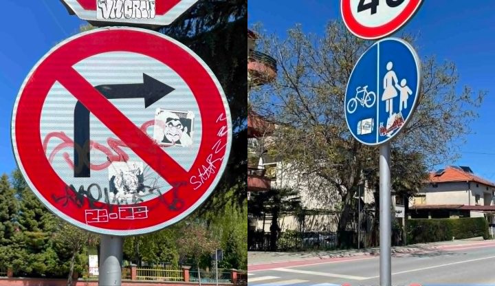 Огледало на култура – Сообраќајните знаци и инфо табли низ Охрид прошарани со спреј или прекриени со налепници (Фото)